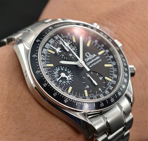 omega speedmaster triple day date|omega speedmaster day date month.